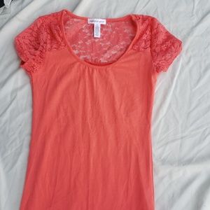 Lace and lycra shirt. Never been worn. No tags tho